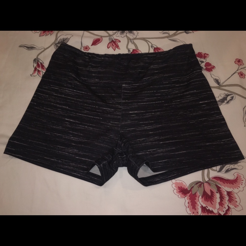 Gray spandex shorts.